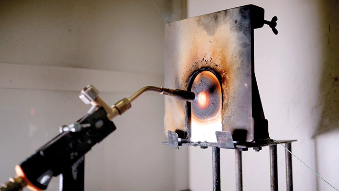 Front side steel substrates with Polyresyst® IC6005 exposed to a 1100-degree Celsius flame